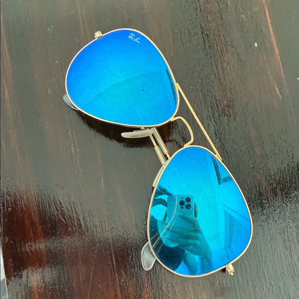 Ray-Ban Gold Frame Sunglasses with Vibrant Blue Lenses